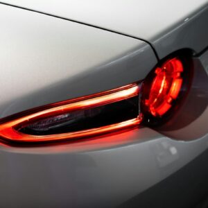 A close up of the tail light of a car