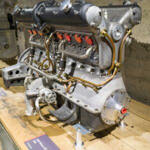 a large engine sitting on top of a wooden table