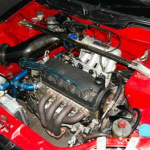 the engine compartment of a car with the hood up
