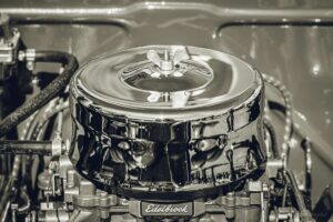 a black and white photo of a car engine