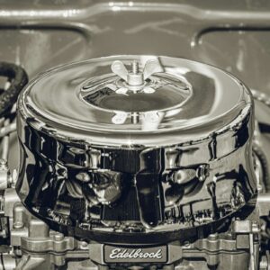 a black and white photo of a car engine