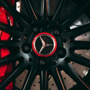 black and red wheel with tire
