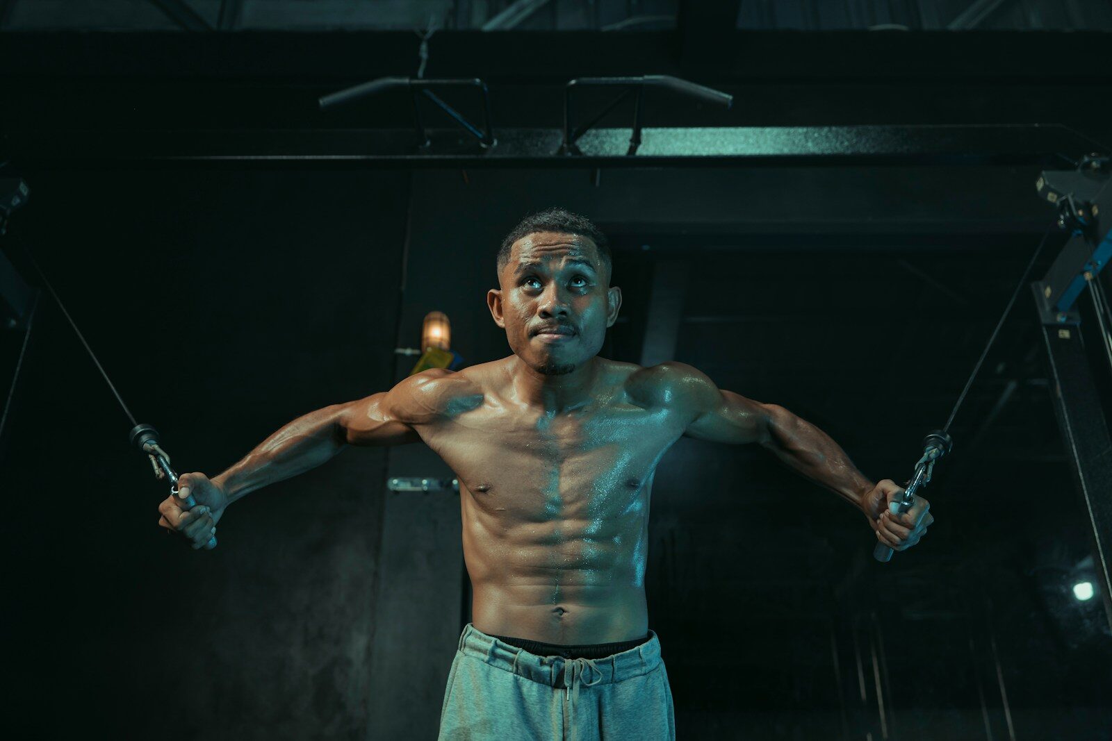 Man is working out in a gym.