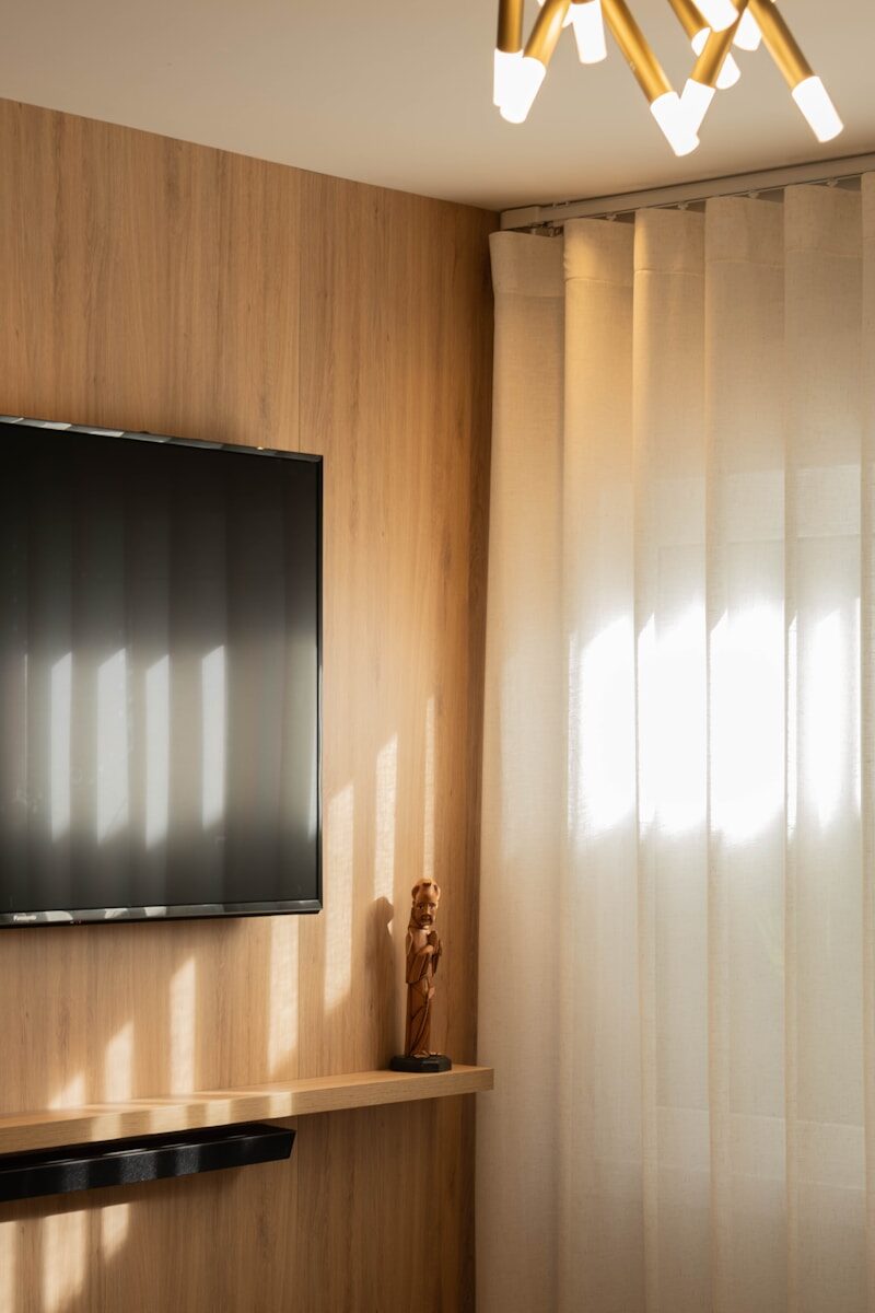 A living room with warm lighting.