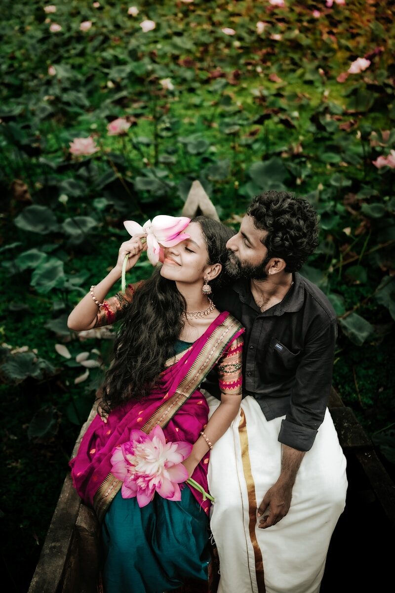 a man kissing a woman on the cheek